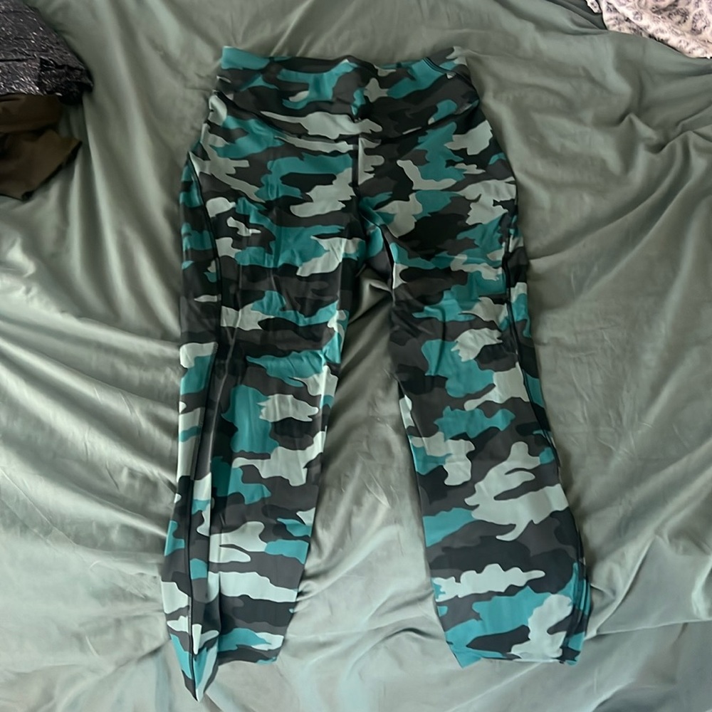 A blue- greenish camo medium leggings